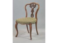 A Victorian mahogany balloon back dining chair with a pierced back