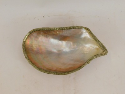 A mother of pearl shell dish, with a reeded and plated outer border, on tripod base, 19cm wide. - 2