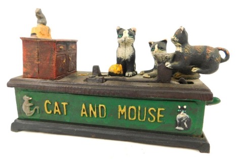 A reproduction cast metal cat and mouse money bank, 19cm wide.