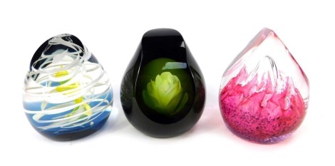 Three glass paperweights, comprising Caithness Serenity 187/500, Volcano 276/650, and Labyrinth 114/500. (3)