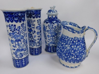 A group of blue and white pottery, to include a Villeroy and Boch ginger jar and cover, transfer decorated with reserves, woodland landscape against a multi-tonal blue prismatic background, 18.5cm high, together with two similar vases, a pair of Oriental - 2