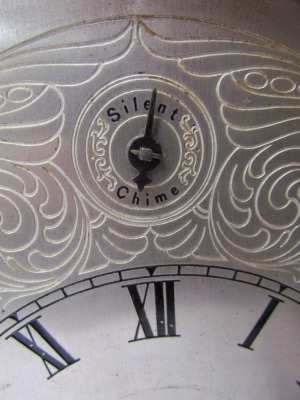 A 19thC mahogany mantel clock, the arched top with brass acorn finials, and boxwood inlay, with a silvered circular Roman numeric dial, with eight day movement striking a bell, 41cm high, 30cm wide, 20cm deep.  - 2