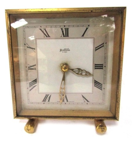 A Bentima brass mantel clock, with eight day movement, with a silvered Roman numeric case, with gold hands, 11cm x 11cm.