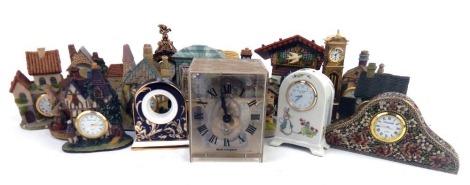 A group of novelty mantel clocks, comprising Park Lane cottage clocks, brass miniature longcase, a Peter Rabbit Wedgwood mantel clock, miniature cuckoo clock, etc. (1 tray)