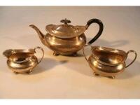 A George VI squat ovoid three-piece silver tea service comprising of tea