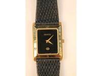 A lady's Gucci gold plated tank shape wristwatch