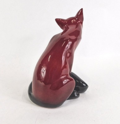 A Royal Doulton Flambe model of a seated fox, printed mark in black to underside, 24cm high. - 2