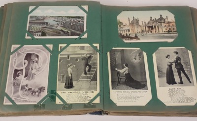 An album of early 20thC postcards, to include real photo, some comical, ships, First World War, etc. - 3