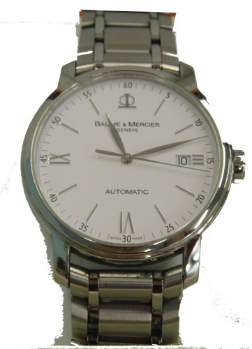 A Baume and Mercier Classima executive gentleman's wristwatch, model 6554, with white enamel dial, silvered markers and date aperture on a stainless steel bracelet, the dial 3.5cm wide, boxed.