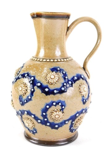 A Royal Doulton Lambeth ware stoneware jug, limited edition decorated in the manner of George Tinworth, number 59/100, artists monogram to underside and impressed marks, 23cm high.