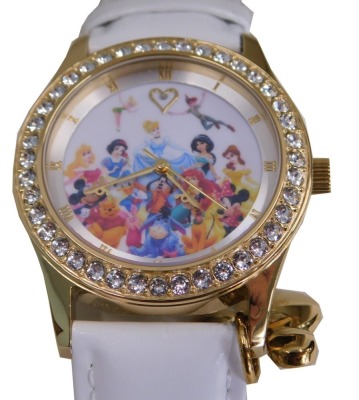 A Bradford Exchange Disney Believe in Magic wristwatch, depicting the classic Disney figures, on a white leather strap, the dial 3cm wide, boxed.