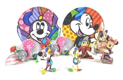 A collection of Disney Showcase collection figures, comprising two Dumbo figures, two Mickey Mouse collectors plates, Mickey Mouse figure, Donald Duck figure, and three Disney traditions, my love, demure and sweet, and a hanging Christmas decoration of Mi