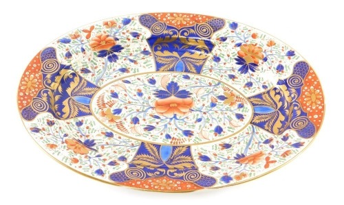 A 19thC Derby porcelain Imari pattern meat plate, of oval form, D mark beneath, 52cm wide. (AF)