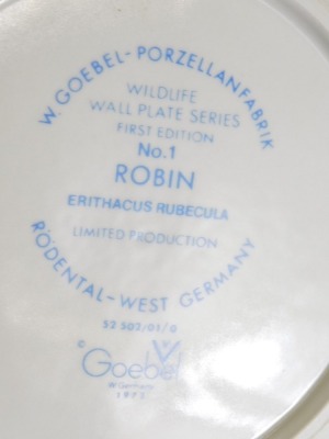 A pair of Goebel wildlife plates, a Goebel Michelangelo vase, two Hummel figures and a rabbit. (6) - 6