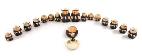 A collection of Goebel monks, to include jugs, matchbox stand, ashtray, etc.