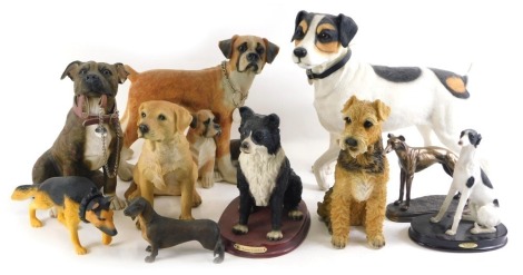 A Leonardo Collection Dog Studios figure of a Staffordshire Bull Terrier, large figure of a Jack Russell, a Boxer, Labrador, etc.