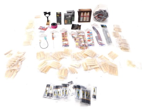 Various musical instrument cleaning kits, to include Helin clarinet brushes, Dunlop guitar cleaning kit, various Ernie Bell string cleaners, etc. (1 box)