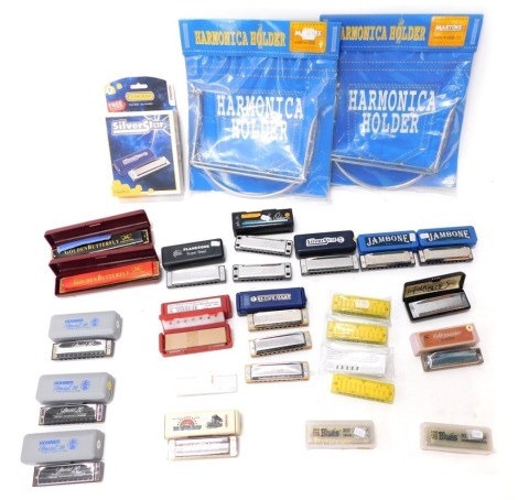 A quantity of harmonicas, to include a Hohner Progressive Pro pack, containing three harmonicas, AC&G harmonic holders.