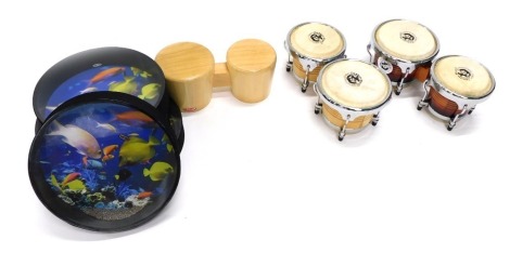 Three Planet Music 14" ocean drums, boxed, a set of Stagg bongos, and two further sets of bongos. (7)