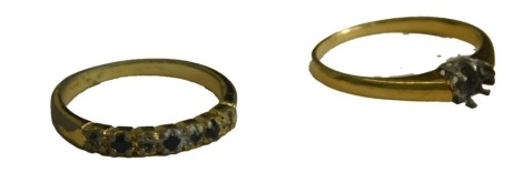 Two dress rings, comprising a 9ct gold single stone dress ring frame, and a plated half hoop eternity, 2.7g all in. (2)