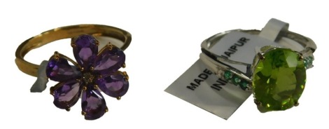 Two QVC 9ct gold dress rings, each stone set, with amethyst cluster the other with green stones, 5.1g all in.