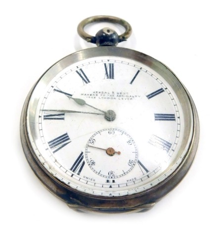 A Kendall and Dent London Lever silver pocket watch, with white enamel Roman numeric dial and seconds dial, in white metal case stamped 935, with key wind and outer plastic Bakelite case, 100.6g all in.