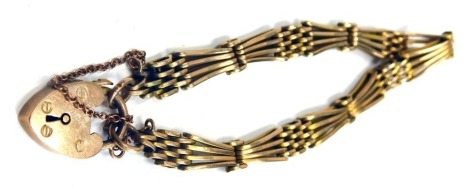 A 9ct gold gate bracelet, of four bar fan design, with heart shaped padlock and safety chain, 18cm long, 11.5g all in.