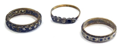 A group of dress rings, comprising a 9ct gold and silver paste stone set dress ring, 9ct gold and silver eternity ring, and a 9ct gold and silver eternity ring, set with blue stones, 6.2g all in. (3, AF)