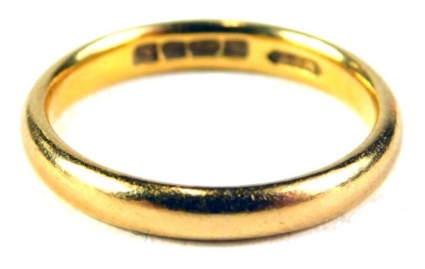 A 22ct gold wedding band, of plain design, ring size M½, 4.2g.