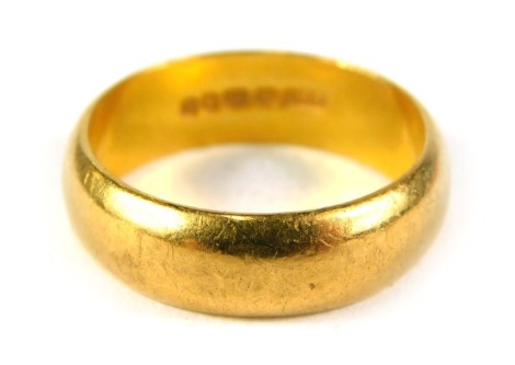 A 22ct gold wedding band, of plain design, ring size N½, 6.9g.