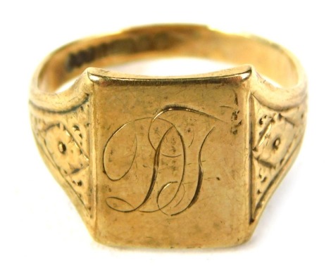 A 9ct gold signet ring, the panel with initials DT, with floral shoulder, ring size P½, 3.8g all in.