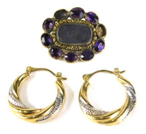 A pair of 9ct gold bicolour drop earrings, 1.5g, and a Victorian memorial brooch, in Pinchbeck with amethyst border. (AF)