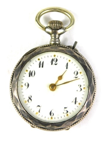 A Continental fob watch, with hammered outer casing, with vacant cartouche, white enamel dial, gold hands, bezel wind, white metal unmarked, 8.7g all in.