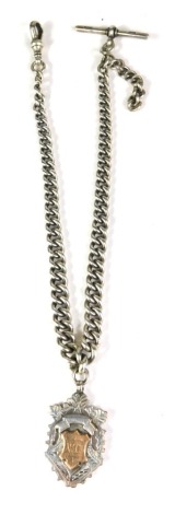 A silver curb link watch chain, with clip and T bar, and a crest bearing initials WC, 30cm long, 54.7g all in.