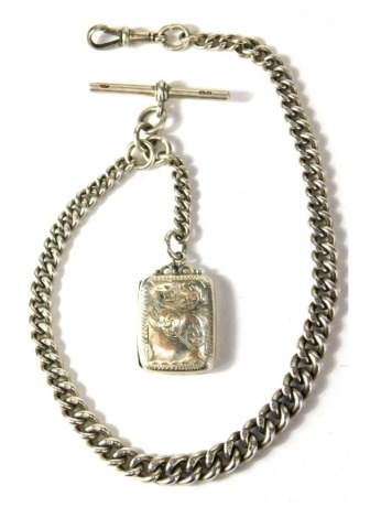 A silver curb link watch chain, with T bar and clip, and a George V silver stamp case, 32cm long, 42.1g.