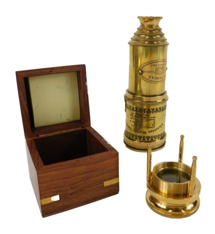 A Victoriana brass two draw replica telescope and stand.