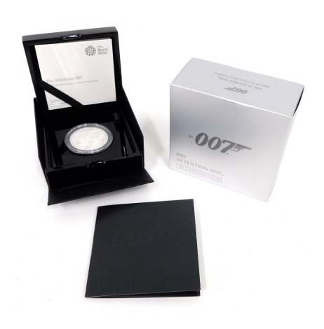 A James Bond OO7 2oz silver proof coin, Pay Attention OO7, no.2, in outer case and box.