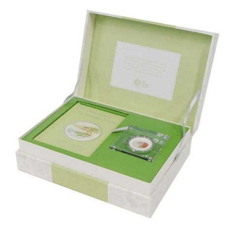 A Royal Mint Beatrix Potter limited edition coin and book gift box set, The Tale of Mr Fisher, in outer case and box.