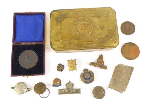 A Christmas 1914 tin, Imperial Service badge, military buttons, peace medallion for 1919, and a War for Civilisation medal, rubbed. (1 box)