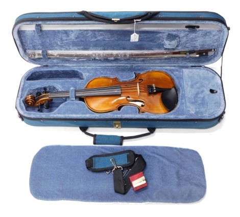 A Hidersine Giovanni two piece split back violin, bearing Giovanni label, with bow, in soft shell case.