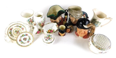 A group of named ceramics, comprising three large Royal Doulton character jugs, Smuggler, The Poacher, Gone Away, Royal Albert Old Country Roses trinkets, Coalport Ming Rose pattern dressing table wares, two miniature Royal Doulton character jugs, and an 