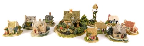 A group of Lilliput Lane cottages, comprising Oak Cottage, The Gingerbread Shop, Holly Tree House, Cockleshells, Daisy Cottage, Honeysuckle Dovecote, Potter's Beck, Cranberry Cottage and Crook End, boxed and two unboxed cottages, Tanglewood and Riverview.