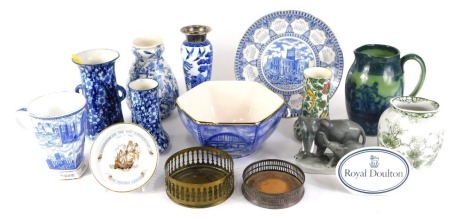 A collection of Royal Doulton and other ceramics, comprising Doulton Burslem Isthmian vase, silver rim and Royal Doulton blue and white stem vase, brass pierced ashtrays, Ringtons mug, etc. (1 tray)