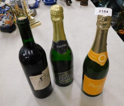 Three bottles of alcohol, comprising a Fortnum and Mason St Estephe 1993 red wine, a Bucks Fizz and a Festini. (3)