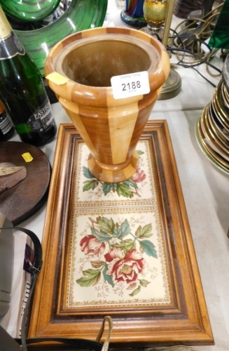 A turned wooden fruit stand, and a two tiled serving tray.