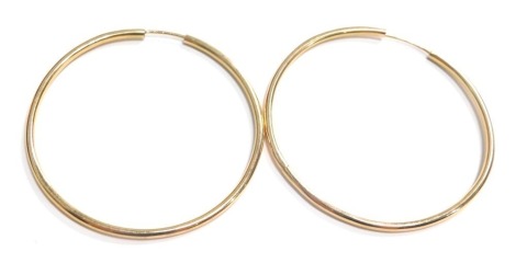 A pair of hoop earrings, yellow metal stamped 375, 6cm diameter, 8.7g.