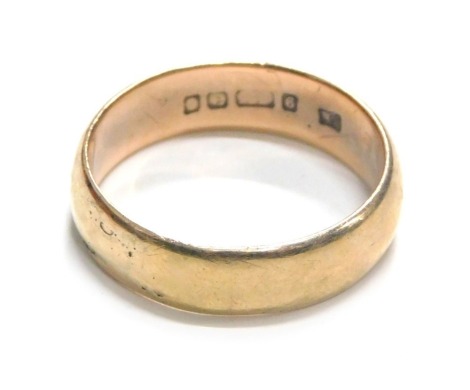 A 9ct gold wedding band, of plain design, ring size X, 7.2g.