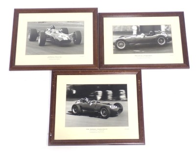 After Alan R Smith. Three prints, Mike Hawthorn Scuderi Ferrari British Grand Prix Aintree 1957, Peter Collins Scuderi Ferrari Aintree 1957, and Graham Hill Team Lotus Silverstone 1967, 35cm x 25cm, framed and glazed. (3)