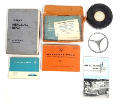 A steering wheel boss, together with Mercedes mascot, 220 Motor Manual 1956-60, Glenn's Mercedes Benz Workshop Manual, a Mercedes 280SE 1972 Workshop History, comprising service booklet, maintenance booklet, owner's manual and C catalogue, etc. (a quantit