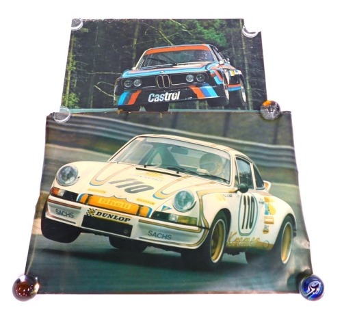 Four motor racing prints, unframed.